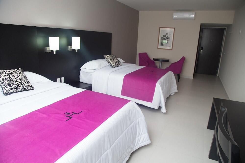 Foto de una habitación de Hoteles HAUS