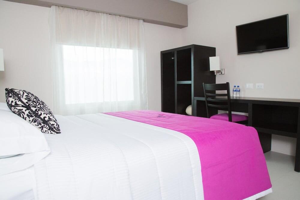 Foto de una habitación de Hoteles HAUS