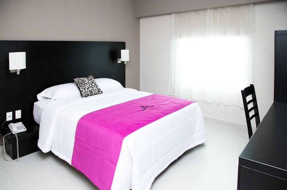Foto de una habitación de Hoteles HAUS