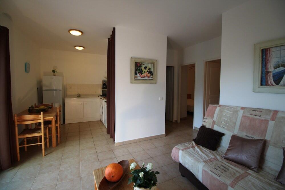 Foto de una habitación de Aparthotel Residence Helios