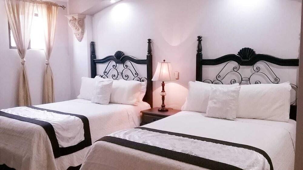 Foto de una habitación de Hotel Hacienda los Narcisos