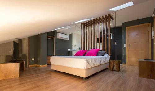 Foto de una habitación de Apartamentos San Justo Plaza