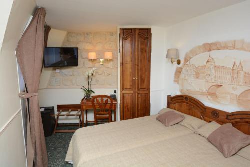 Foto de una habitación de Familia Hotel