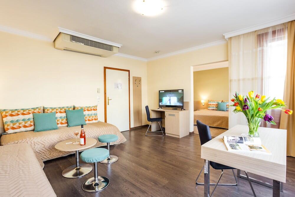 Foto de una habitación de Geneva Hotel
