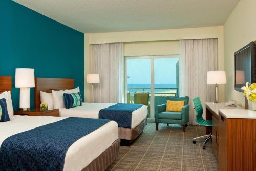 Foto de una habitación de Complejo Ocean Place Resort &amp;amp; Spa