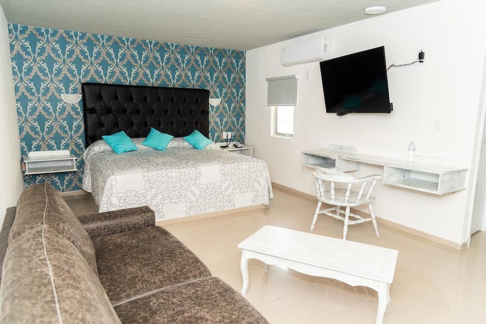 Foto de una habitación de Grand Hotel KYRIOS Veracruz