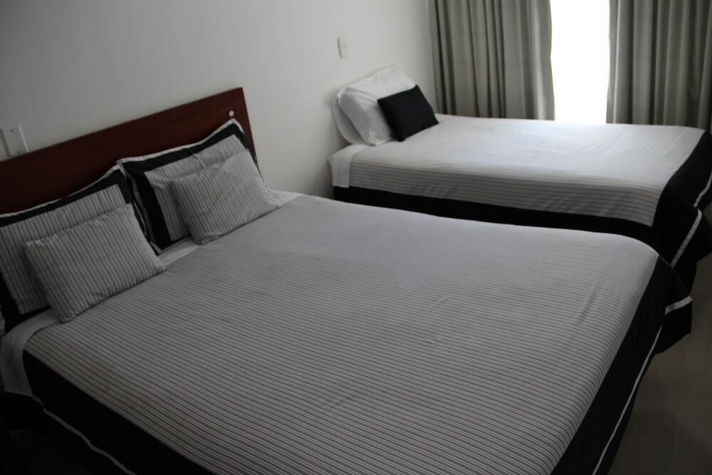 Foto de una habitación de Hotel Hontibon