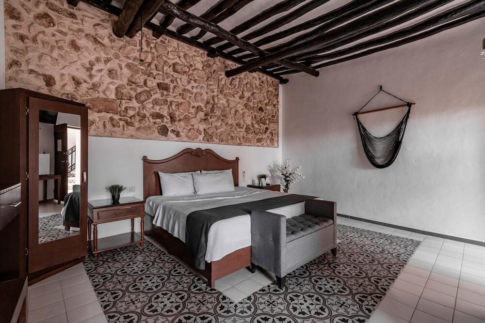 Foto de una habitación de Hotel Colonial Zaci by GuruHotel