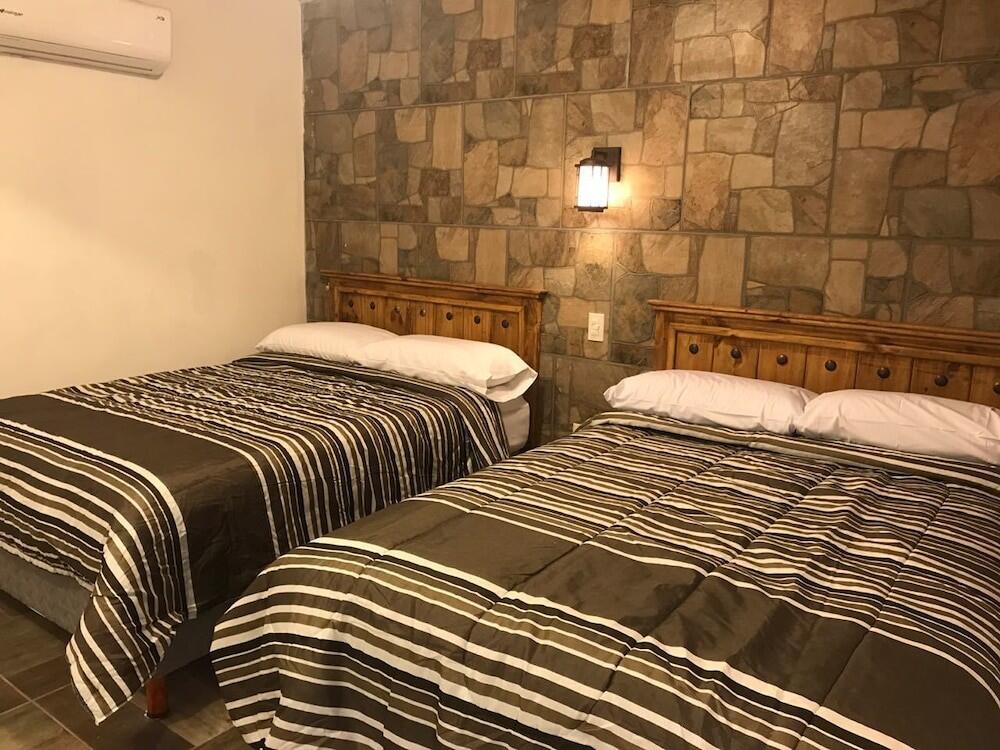 Foto de una habitación de Hotel Venados Inn