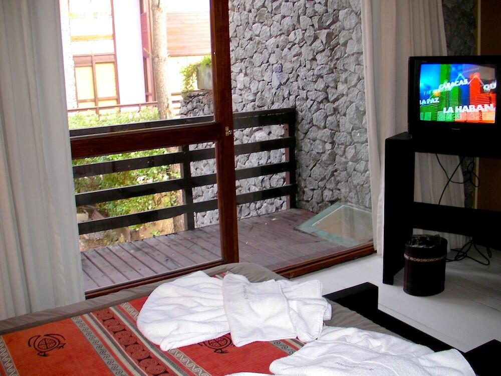 Foto de una habitación de Altos Medanos Cabañas &amp;amp; Club de Bosque