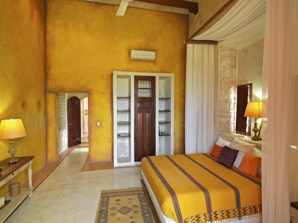 Foto de una habitación de Hotel Hacienda Sacnicte