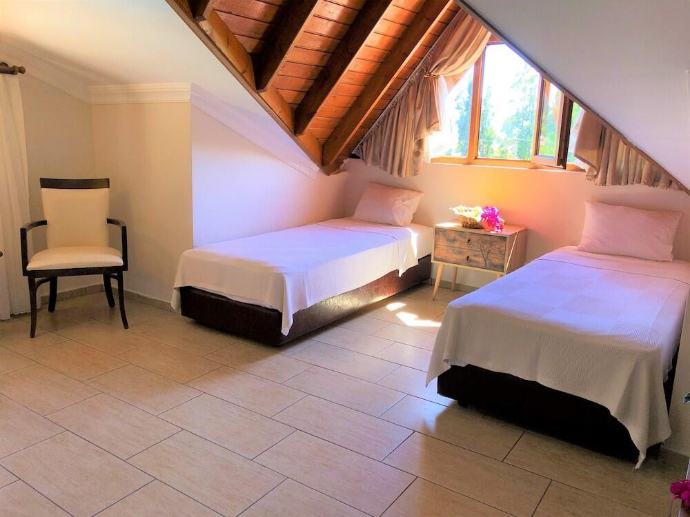 Foto de una habitación de Mesken Inn Hotel