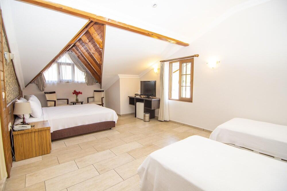 Foto de una habitación de Mesken Inn Hotel