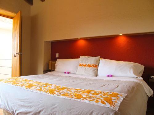 Foto de una habitación de Hotel Las Luciernagas (Adults Only)