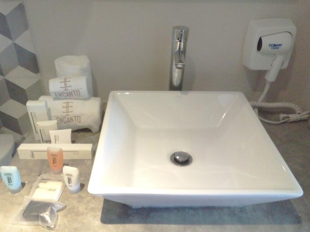 Foto del baño de Hotel El Encanto
