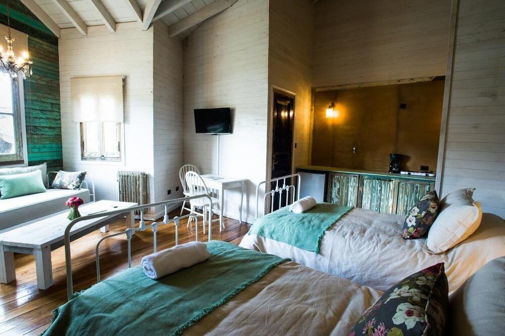Foto de una habitación de Aparthotel Departamentos de El Mercado