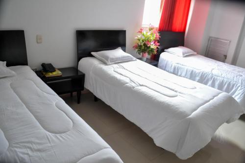 Foto de una habitación de Hotel Continental Express