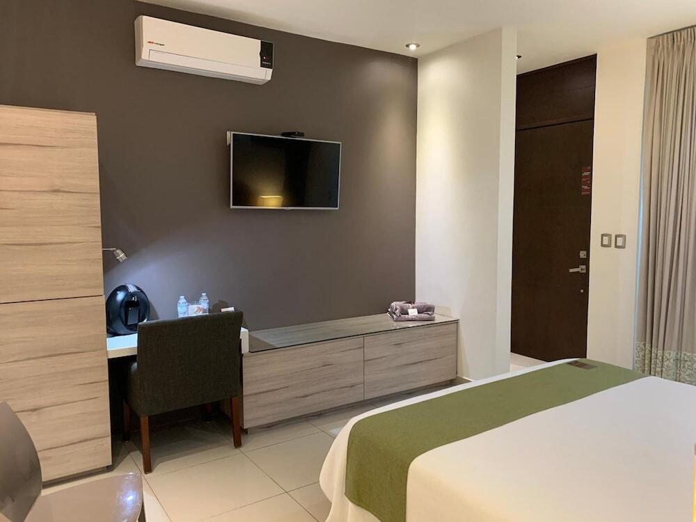 Foto de una habitación de Amoe Hotel Boutique &amp;amp; Spa