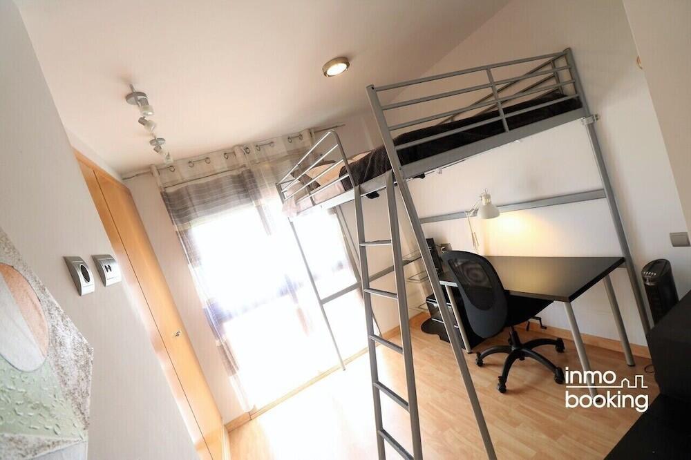 Foto de una habitación de InmoBooking Disseny Apartments