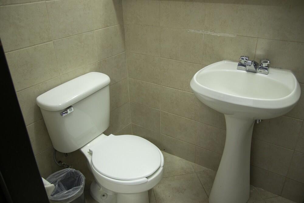 Foto de una habitación de Hotel HAUS Express