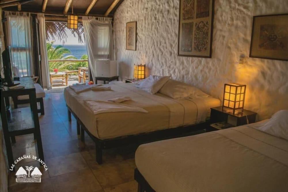 Foto de una habitación de Las Cabañas de Antica