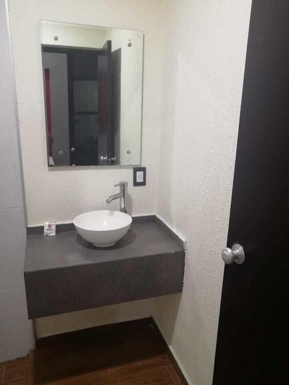 Foto del baño de Hotel Jorge Alejandro