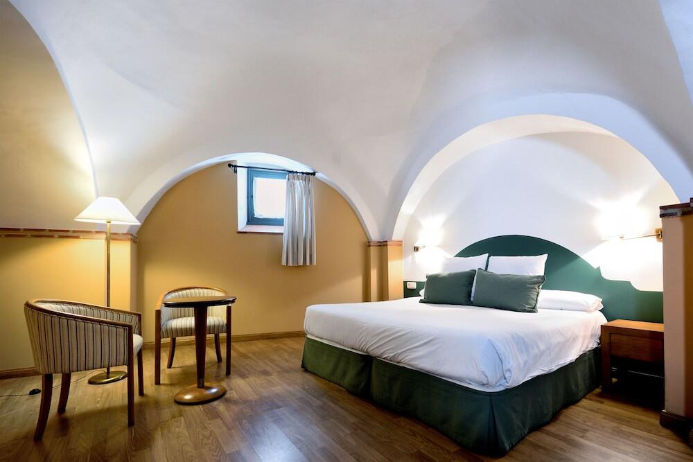 Foto de una habitación de Hotel Ahc Palacio Coria