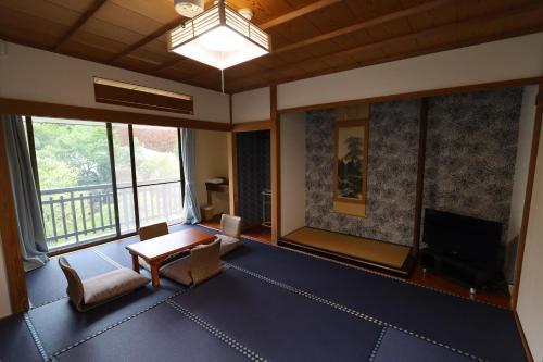 Foto de una habitación de Onsen &amp;amp; Garden -Asante Inn-