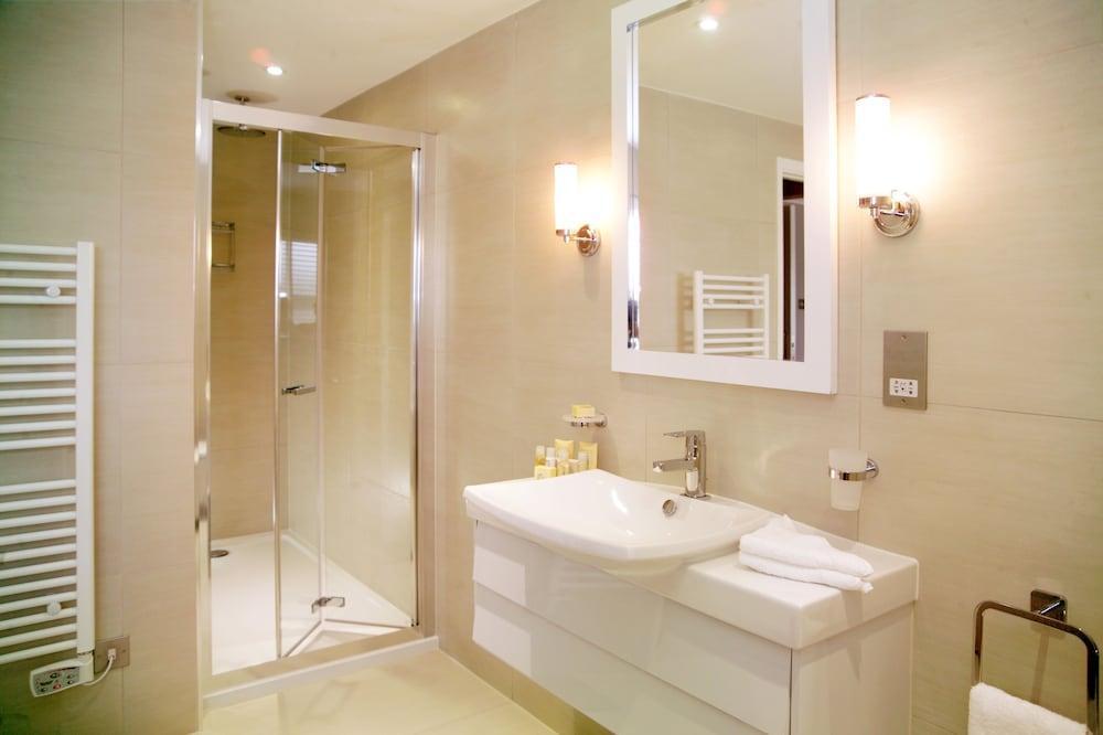 Foto del baño de Hotel La Place