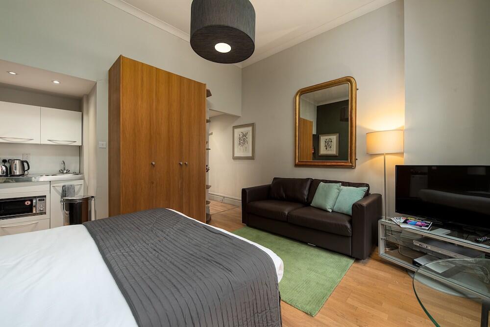 Foto de una habitación de The Apartments by CAPITAL