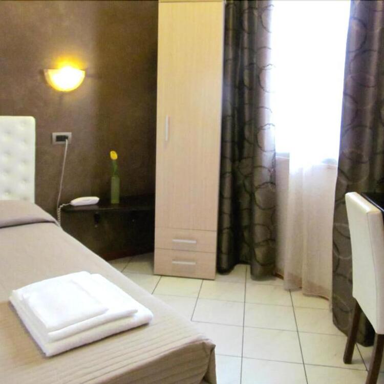 Foto de una habitación de Hotel Romagna