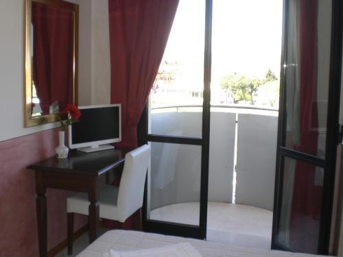 Foto de una habitación de Hotel Romagna