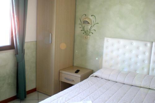 Foto de una habitación de Hotel Romagna