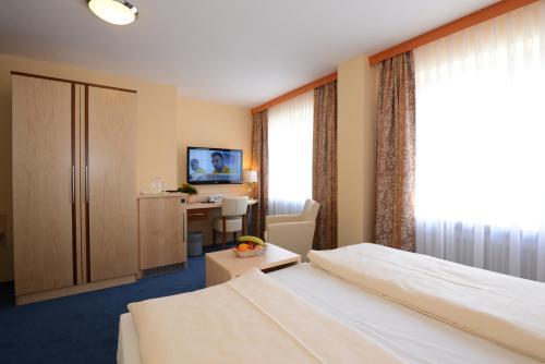 Foto de una habitación de Hotel Apollo Garni