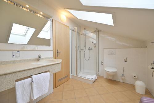 Foto del baño de Hotel Apollo Garni