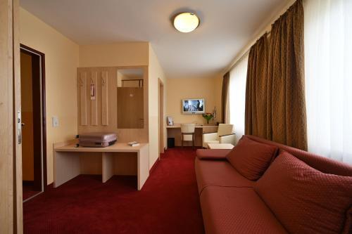 Foto de una habitación de Hotel Apollo Garni